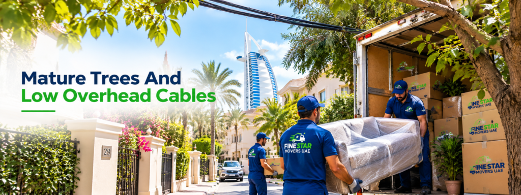 Movers carrying a wrapped sofa through a gated villa entrance in Dubai