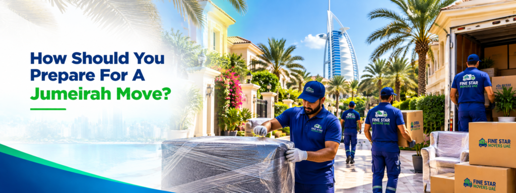 Fine Star Movers UAE team transporting wrapped office furniture and equipment